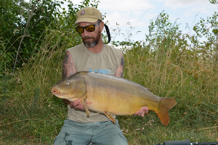 Clint with a 29lb 12oz mirro from turtles