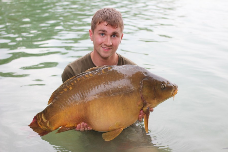 Ryan with a 34lbs mirror