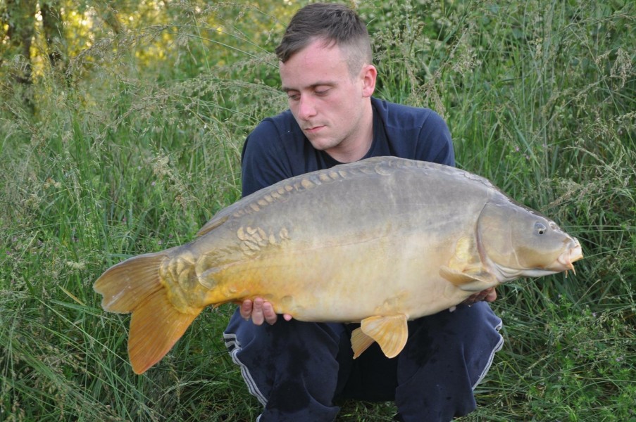 jake with a 33lbs mirror
