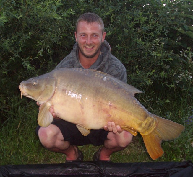 Lewis with a 32lbs mirror