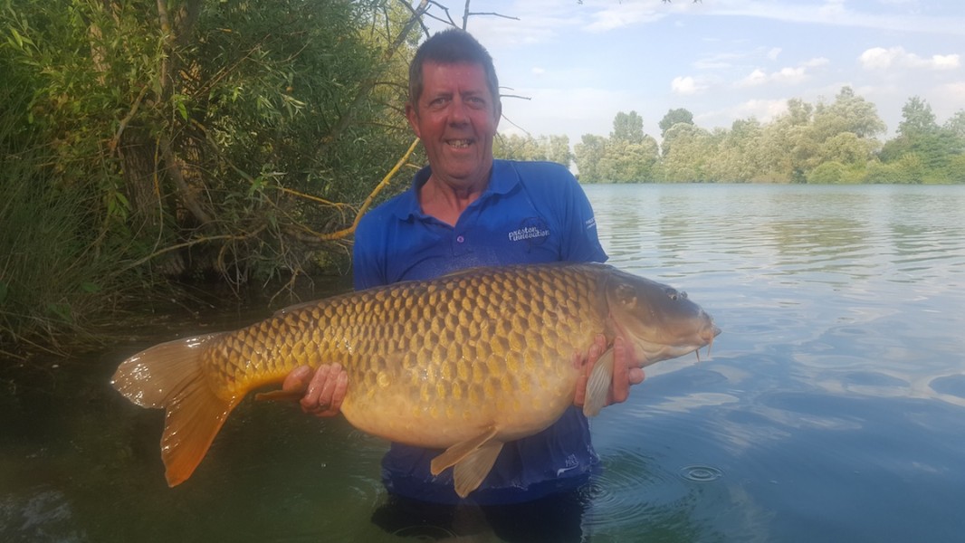 Colin with a PB 41lb common, known as The Wedge