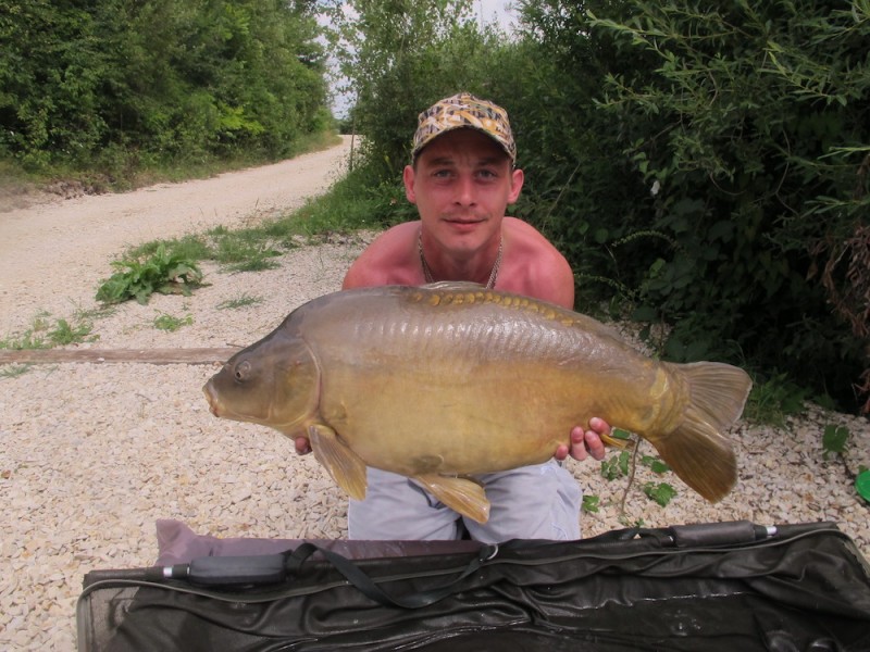 Rob with a 29lb12oz mirror from Birches