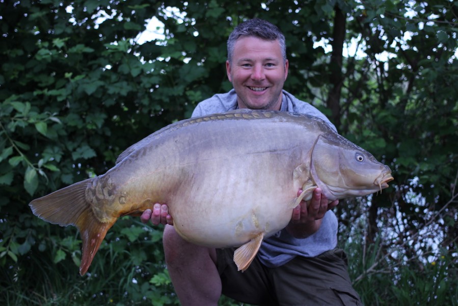 Chris with a cracking 48lb12oz mirror from T2