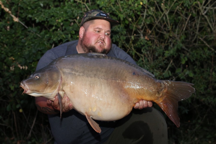 Craig "the hauler" Bastin with one of his many captures "Ringo" at 38lb..........